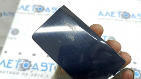 The left outer fender light cover for a Mazda CX-90 24-26 is worn.
