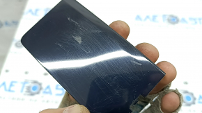 The left outer fender light cover for a Mazda CX-90 24-26 is worn.