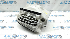 The bare heater housing and ventilation of the Mazda CX-90 24-26