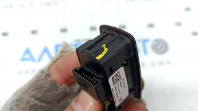 The anti-theft system button on a Porsche Macan 15-26 has a broken mount.