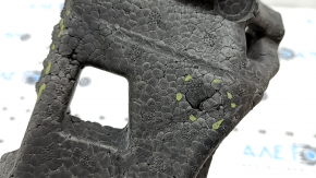 The front bumper absorber of the Porsche Macan 15-18 is dented, broken, missing a fragment