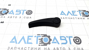 The hood release handle for the Porsche Macan 15-23 is located under the hood.