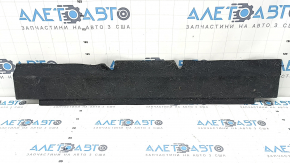 The front trunk floor of a Porsche Macan 15-26 is black and needs cleaning, it has come apart.