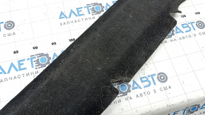 The front trunk floor of a Porsche Macan 15-26 is black and needs cleaning, it has come apart.
