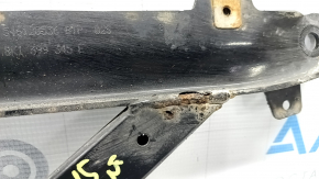 The front subframe strut bar of a Porsche Macan 15-26 is rusty.