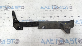 The front left mudguard liner for a Toyota Highlander 20-26 is worn.