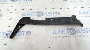 The front left mudguard liner for a Toyota Highlander 20-26 is worn.