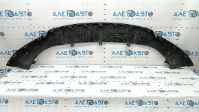 The front bumper lip of a Porsche Macan 15-18 is cracked, dented, has scratches, and has cracks in the fasteners. After repair