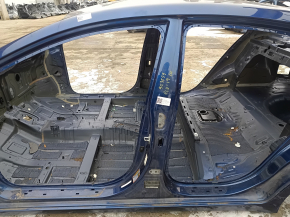 The central left body pillar of a Hyundai Elantra AD 17-20 is dented on the body.
