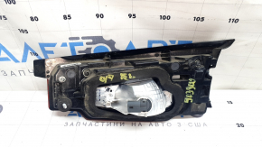 The left interior tailgate light for a Mazda CX-9 16-23 is scuffed.