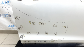 The door is bare, front right, Mazda CX-9 16-23, white 25D, dented, bump