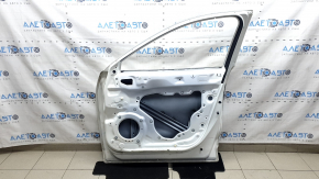 The door is bare, front right, Mazda CX-9 16-23, white 25D, dented, bump
