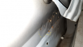 The door is bare, front right, Mazda CX-9 16-23, white 25D, dented, bump