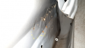 The door is bare, front right, Mazda CX-9 16-23, white 25D, dented, bump