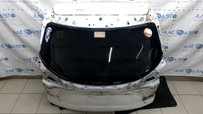 The trunk door is bare with glass for a Mazda CX-9 16-18, electric, white 25D, dented.