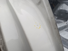 White rear right quarter wing of a Mazda CX-9 16-23, dents on the body