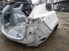 White rear right quarter wing of a Mazda CX-9 16-23, dents on the body