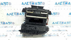The bare heater housing of a Porsche Macan 15-26