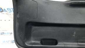 Mazda CX-9 16-23 lower tailgate trim, black scratches, dented plug