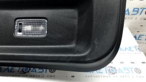 Mazda CX-9 16-23 lower tailgate trim, black scratches, dented plug