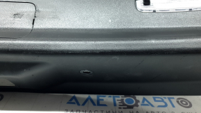 Mazda CX-9 16-23 lower tailgate trim, black scratches, dented plug