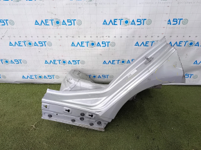 The sunset of the rear fender left BMW 3 F30 4d 12-18 on the body, silver, dented