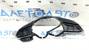 The steering wheel controls on a Mazda CX-9 (16-21) are worn.