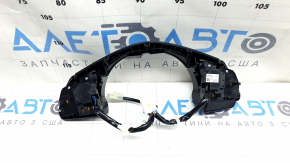 The steering wheel controls on a Mazda CX-9 (16-21) are worn.