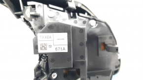 The steering wheel controls on a Mazda CX-9 (16-21) are worn.