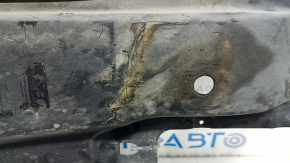The left underbody protection of the Audi A3 8V 15-20 4d, 5d is torn and worn.