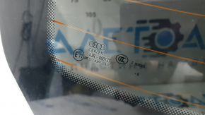 Rear window of Audi A4 B9 17-19, heated, non-factory tinted, scratches, broken contact