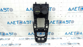 The center console trim with cup holders for the Audi A3 8V 15-20 is worn out.