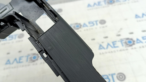 The center console trim with cup holders for the Audi A3 8V 15-20 is worn out.