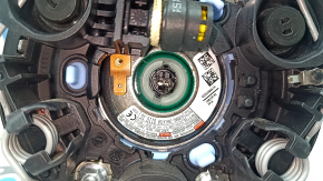The steering wheel airbag for the driver's side of the Audi A4 B9 17-25 is black, with nicks in the chrome and scratches.
