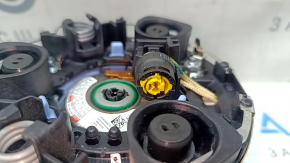 The steering wheel airbag for the driver's side of the Audi A4 B9 17-25 is black, with nicks in the chrome and scratches.