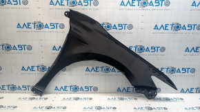 The front left fender of a Toyota Camry v70 18-24 is dented.