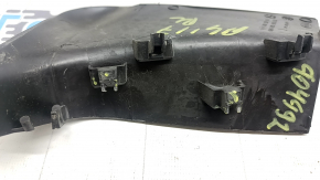The left outer headlight cover for the Audi A4 B9 17-19 has broken fasteners.