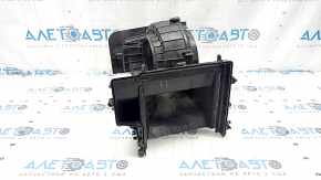 The bare heater housing and ventilation of the Jeep Cherokee KL 14-23