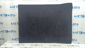 The trunk floor of the BMW 5 G30 17-23 is black and creased.