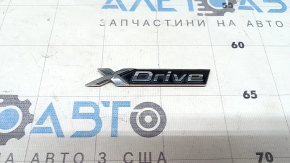 X-Drive emblem on the tailgate of the BMW X7 G07 19-26