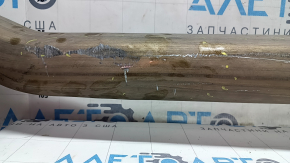 The left exhaust pipe with catalytic converter for a BMW X7 G07 19-22 3.0T is dented.