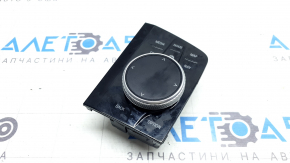 The BMW X7 G07 19-22 monitor control joystick is worn.