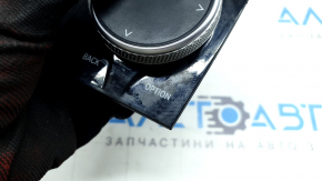 The BMW X7 G07 19-22 monitor control joystick is worn.