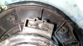 The heater fan motor on a Suzuki Kizashi 10-15 is cracked.