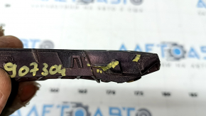 The left front bumper mount on a Toyota Camry v40 is broken.