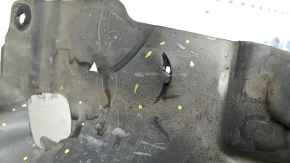 The front right rear fender liner of the BMW X7 G07 19-26 is dented and has tears.
