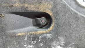 Front left underbody protection for BMW X7 G07 19-22 is dented and has tears