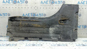 Front right underbody protection for BMW X7 G07 19-22 is dented and has tears