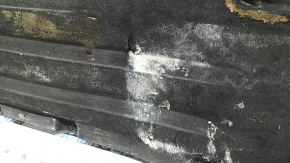 Front right underbody protection for BMW X7 G07 19-22 is dented and has tears
