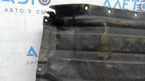 Front right underbody protection for BMW X7 G07 19-22 is dented and has tears